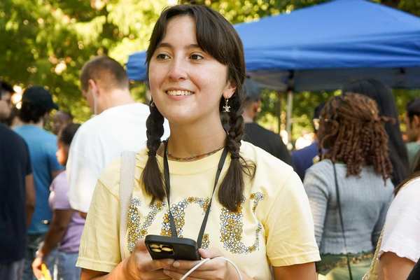 VCU student walking through Monroe Park